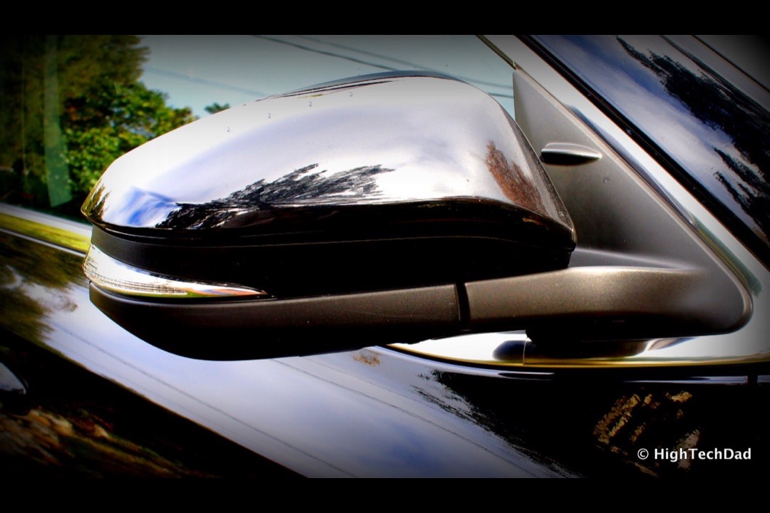 Convex blind spot mirror mounted on the upper outer corner of a car side mirror