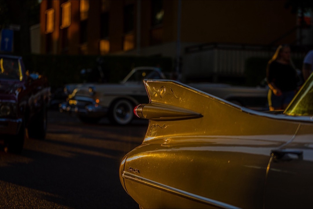 Ceramic coating being applied to a car hood showing high-gloss reflective finish