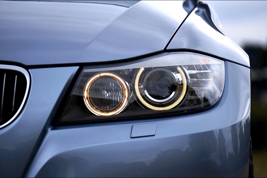 Close-up of a BMW LED headlight assembly showing modern automotive lighting design