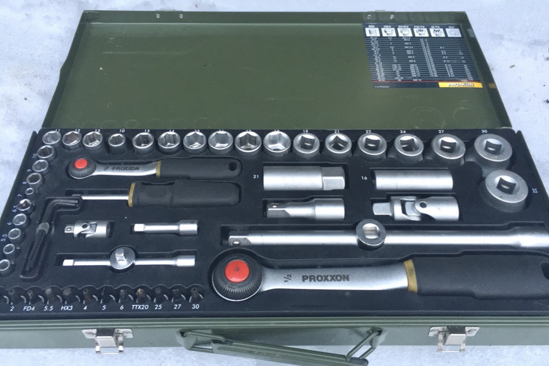 Chrome vanadium socket set arranged in a hard shell case with multiple drive sizes for automotive mechanic work